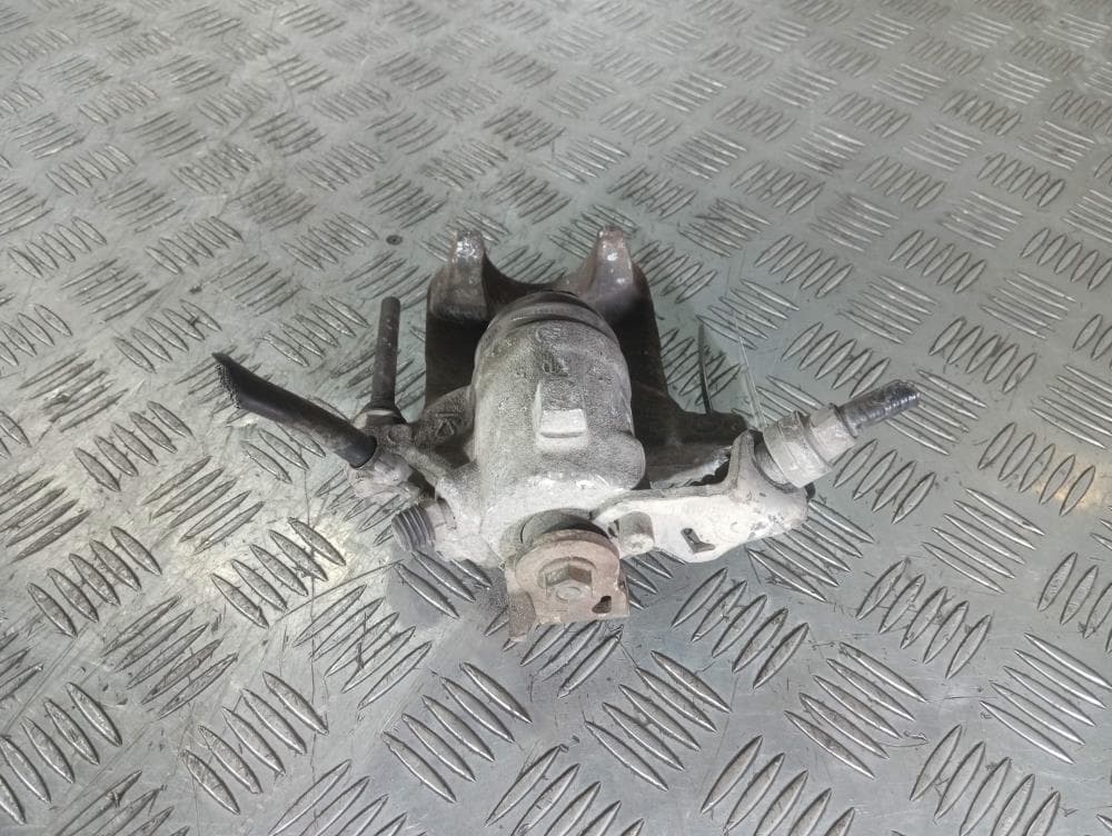 Суппорт задний левый к Volkswagen Golf 4 (97-06)