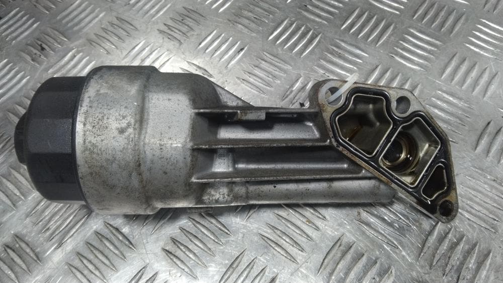 Корпус масляного фильтра к Opel Astra H (04-07)