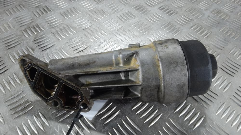 Корпус масляного фильтра к Opel Corsa D (06-11)
