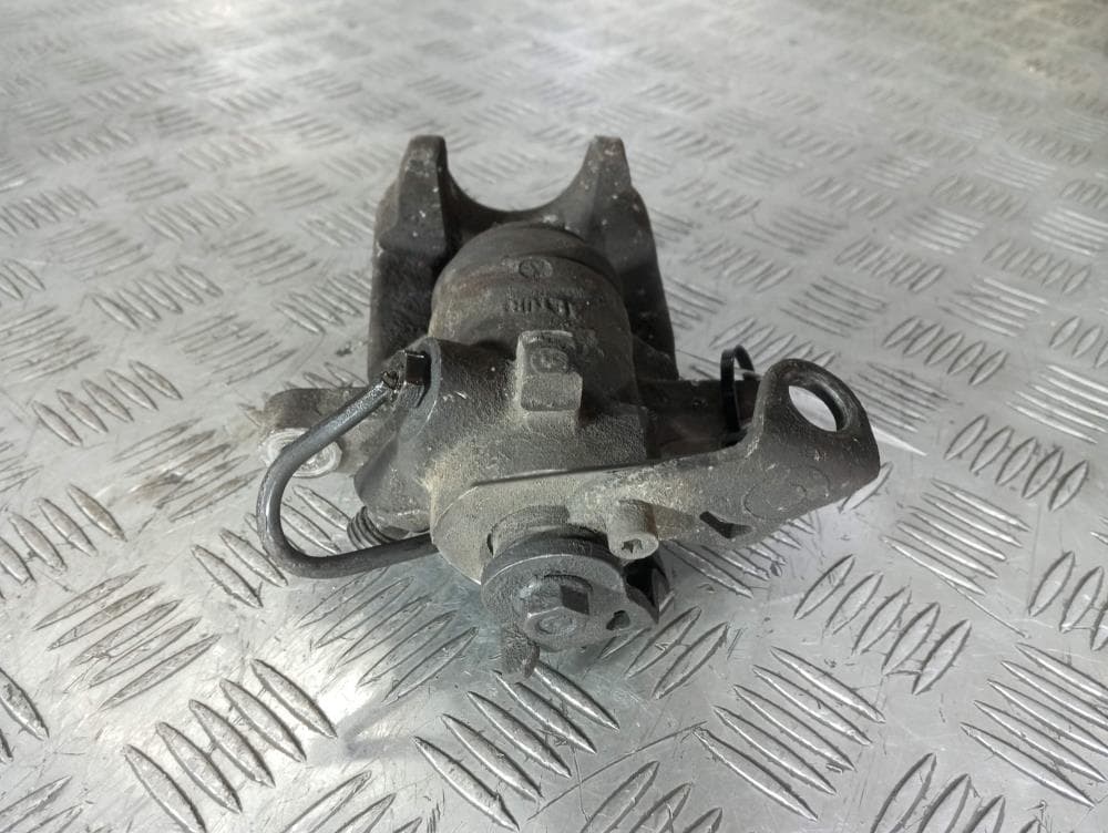 Суппорт задний левый к Citroen C4 1 (04-08)