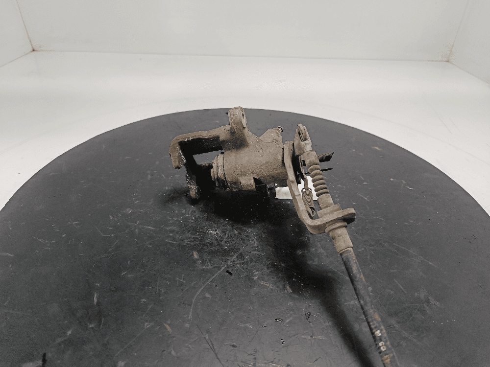 Суппорт задний правый к Nissan  Almera N16 Рестайлинг (03-06)