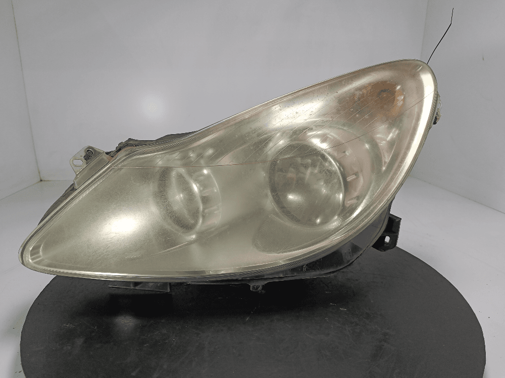 Фара левая к Opel Corsa D (06-11)