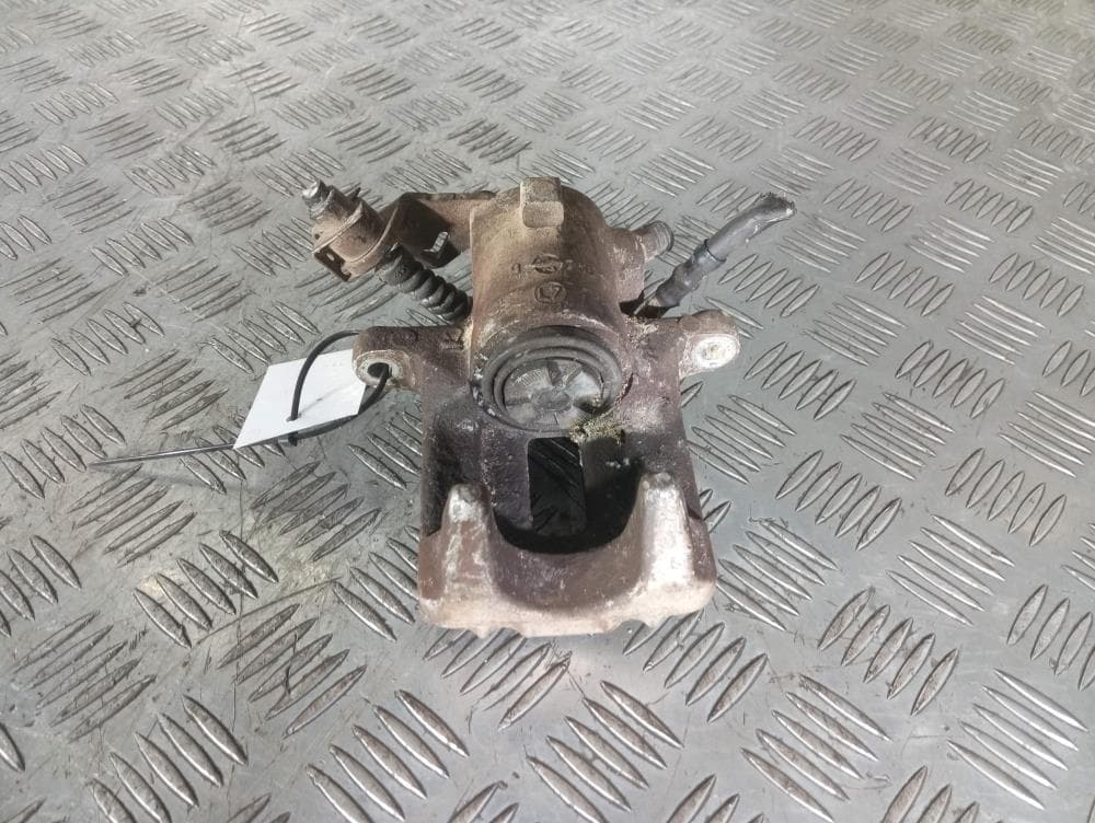 Суппорт задний левый к Volkswagen Golf 4 (97-06)