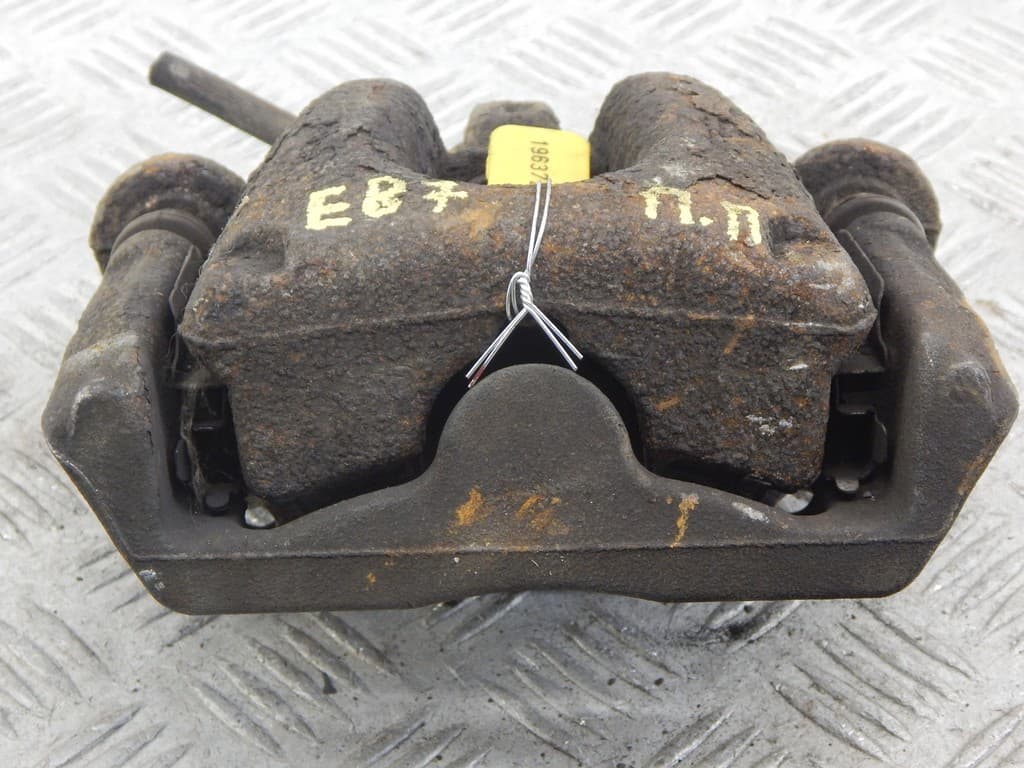 Суппорт передний левый к BMW 1 E81/E82/E87/E88 Рестайлинг (07-11)