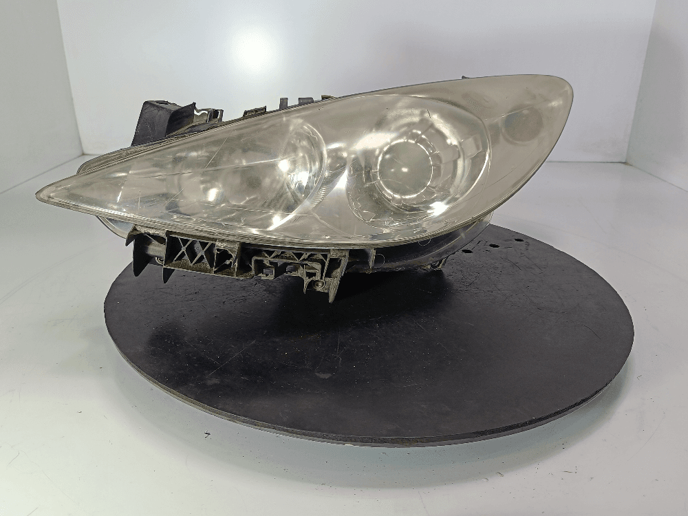 Фара левая к Peugeot 307 Рестайлинг (05-08)
