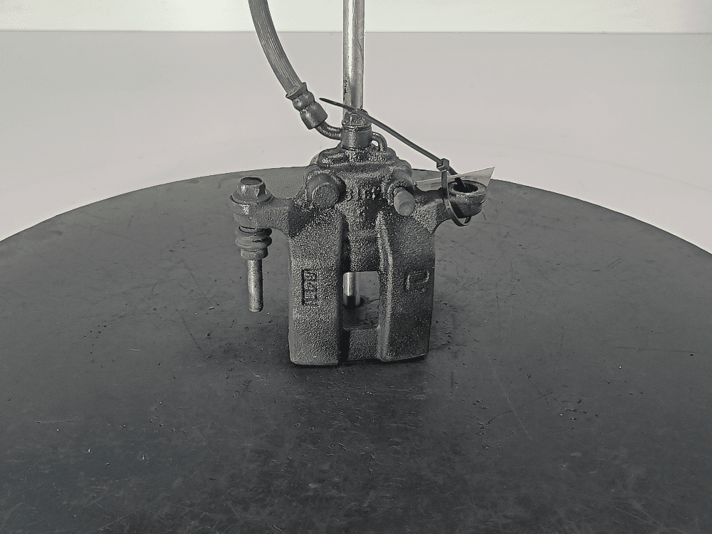 Суппорт задний левый к Suzuki Grand Vitara JT (05-08)