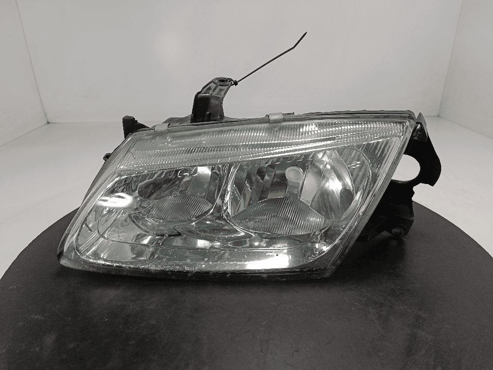 Фара левая к Nissan Almera N16 Рестайлинг (03-06)