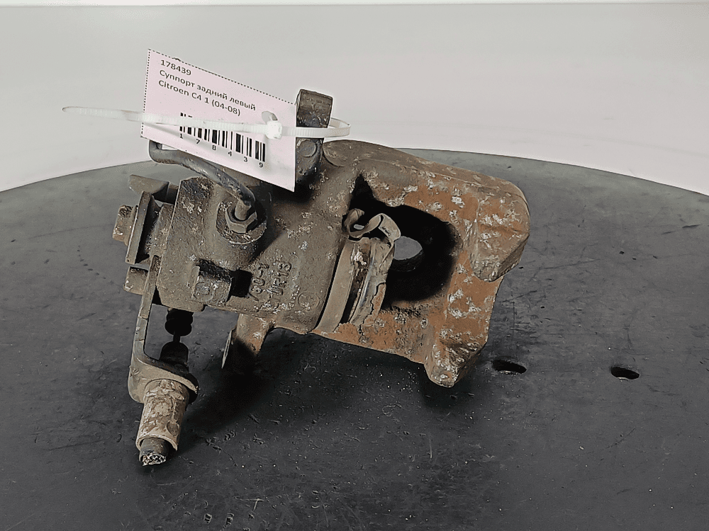 Суппорт задний левый к Citroen C4 1 (04-08)