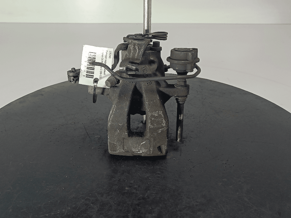 Суппорт задний левый к Citroen C4 Picasso 1 (06-13)