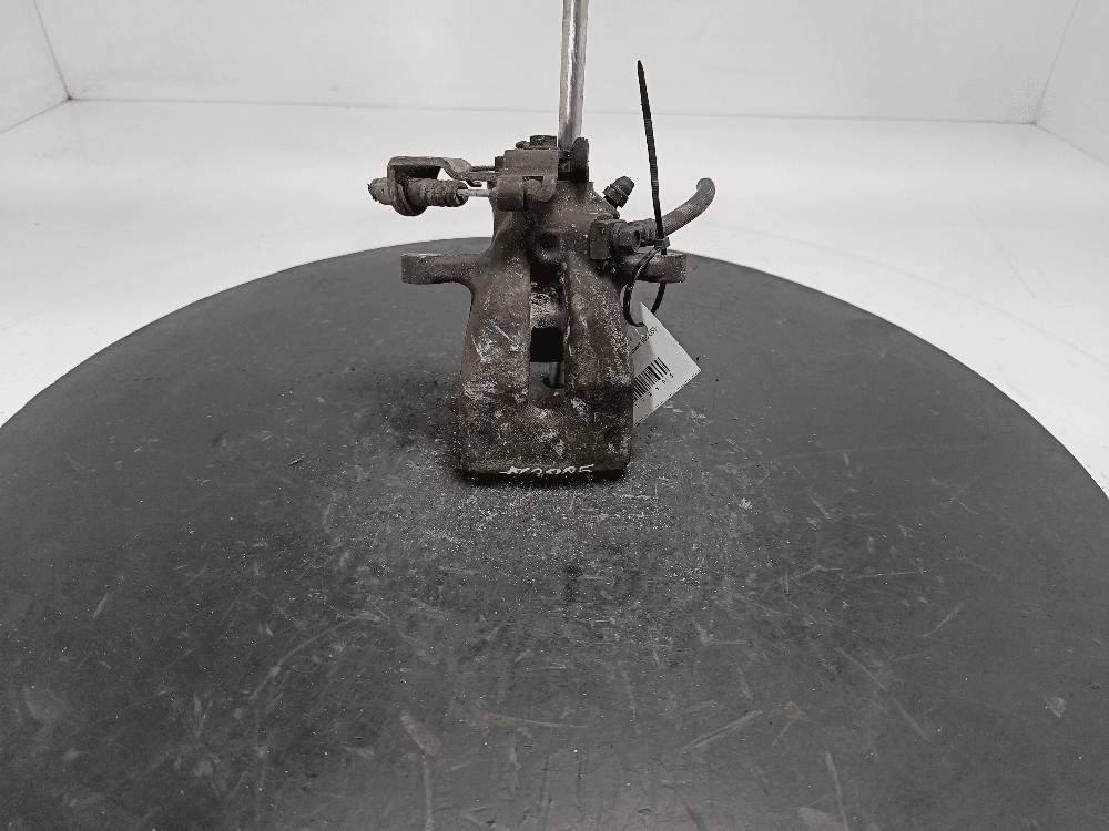 Суппорт задний левый к Opel Zafira A Рестайлинг (03-05)