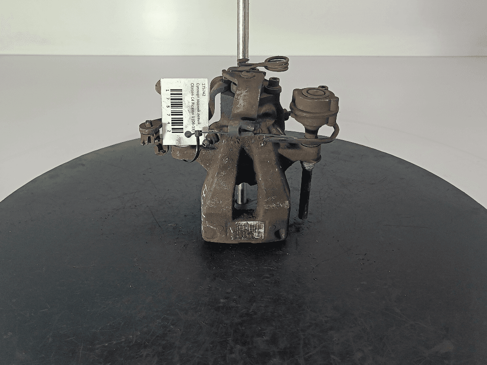 Суппорт задний левый к Citroen C4 Picasso 1 (06-13)