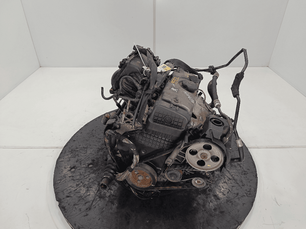 Двигатель к Peugeot 206 1 Рестайлинг (02-09)