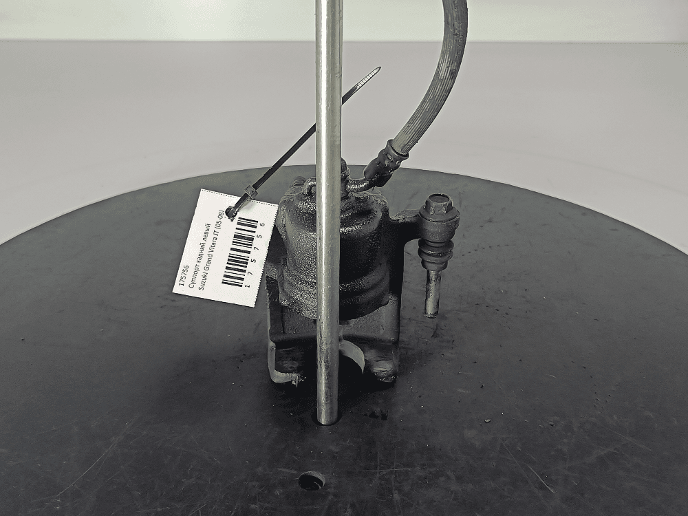 Суппорт задний левый к Suzuki Grand Vitara JT (05-08)