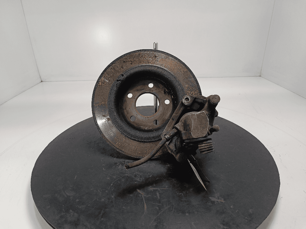 Суппорт задний левый к Ford Focus 2 (04-08)