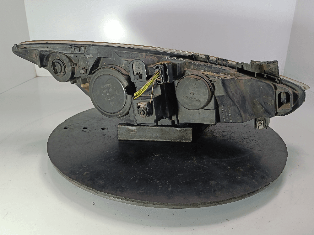 Фара левая к Peugeot 307 Рестайлинг (05-08)