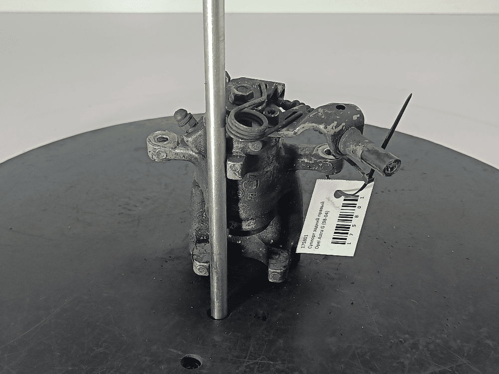 Суппорт задний правый к Opel Astra G (98-04)