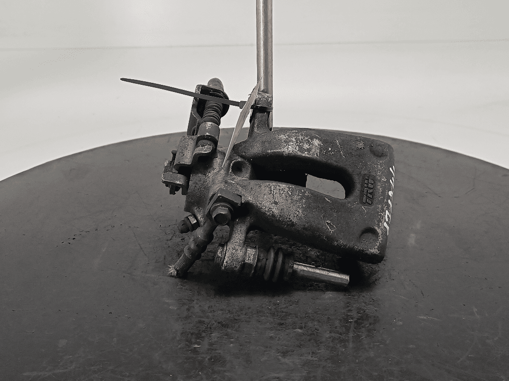 Суппорт задний левый к Opel Astra G (98-04)