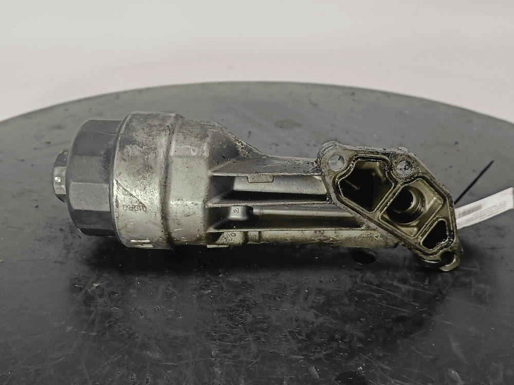 Корпус масляного фильтра к Opel Corsa D (06-11)