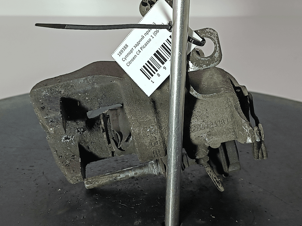 Суппорт задний правый к Citroen C4 Picasso 1 (06-13)