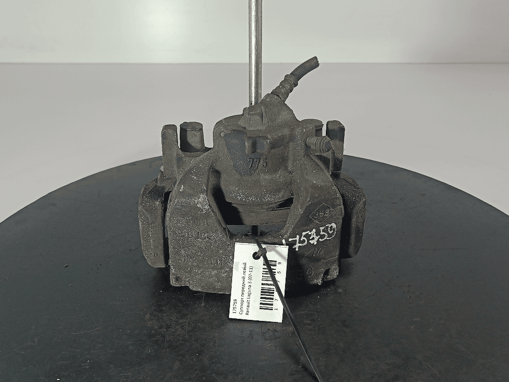 Суппорт передний левый к Renault Laguna 3 (07-11)