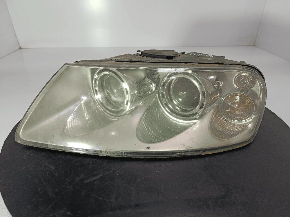 Фара левая к Volkswagen Touareg 1 (02-07)