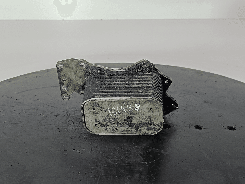 Теплообменник масляного фильтра к Audi A6 C6/4F (04-08)