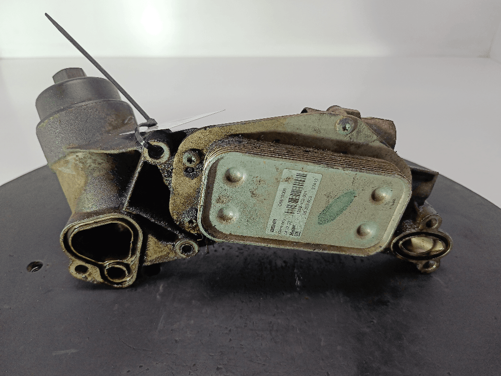 Корпус масляного фильтра к Opel Astra H (04-07)