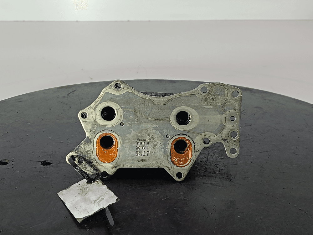 Теплообменник масляного фильтра к Audi A6 C6/4F (04-08)