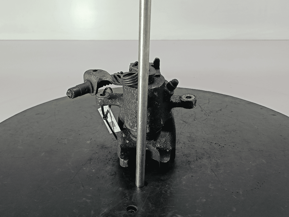 Суппорт задний левый к Opel Astra H (04-07)