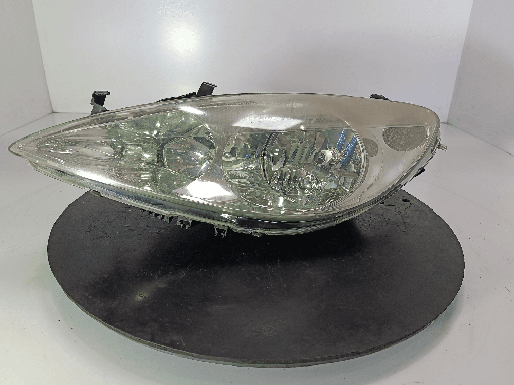 Фара левая к Peugeot 307 (01-05)