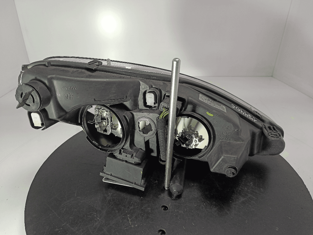 Фара левая к Peugeot 607 Рестайлинг (04-09)