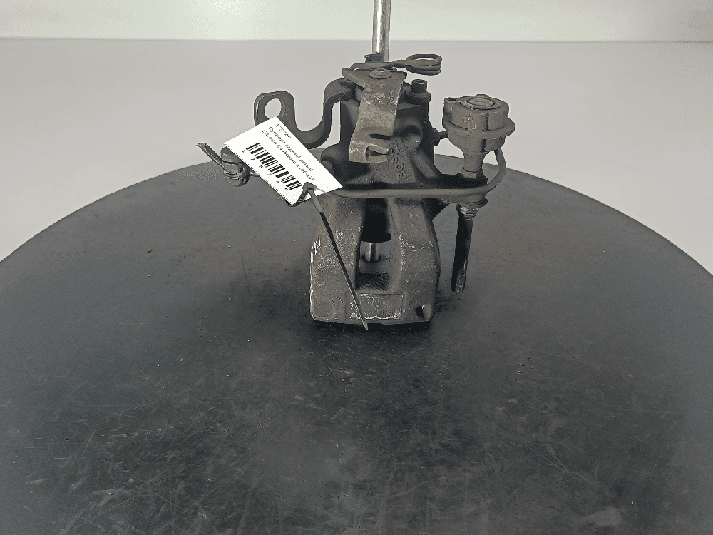 Суппорт задний левый к Citroen C4 Picasso 1 (06-13)