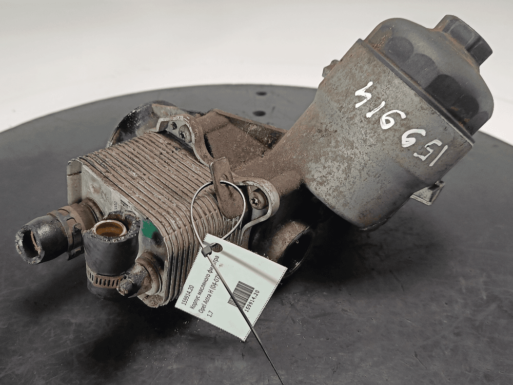 Корпус масляного фильтра к Opel Astra H (04-07)