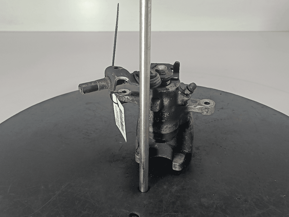 Суппорт задний левый к Opel Astra G (98-04)